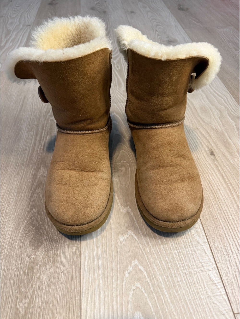 UGG tan suede shearling lined button ankle boots
